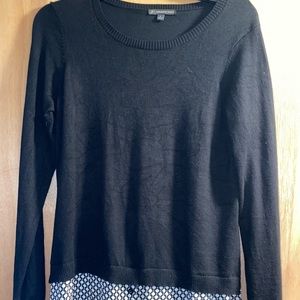 Gently worn women’s layered look sweater. Perfect for the office